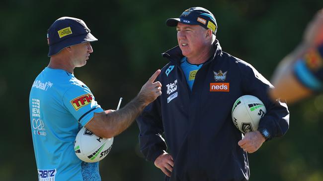 Craig Hodges talks with Luke Burt during a Gold Coast Titans NRL training session. Picture: Chris Hyde/Getty Images