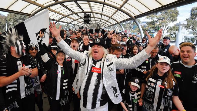 Collingwood fans march to the MCG. Picture: Jason Edwards