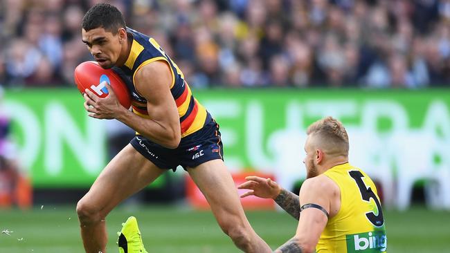 Charlie Cameron takes on Richmond’s Brandon Ellis during the 2017 grand final. Picture: Quinn Rooney/Getty Images