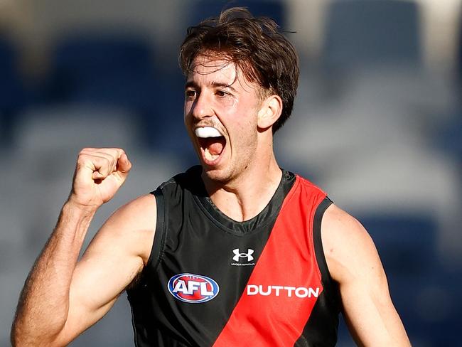 GEELONG, AUSTRALIA - MARCH 01: Nic Martin of the Bombers celebrates during the 2024 AFL AAMI Community Series match between the Geelong Cats and Essendon Bombers at GMHBA Stadium on March 01, 2024 in Geelong, Australia. (Photo by Michael Willson/AFL Photos via Getty Images)