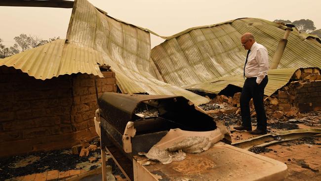 Scott Morrison visits a wildflower farm in an area devastated by bushfires in Sarsfield, Victoria. Picture: AFP