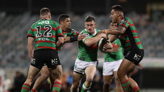 CANBERRA, AUSTRALIA - JULY 25: Jack Wighton of the Raiders breaks through a tackle during the round 11 NRL match between the Canberra Raiders and the South Sydney Rabbitohs at GIO Stadium on July 25, 2020 in Canberra, Australia. (Photo by Mark Metcalfe/Getty Images)