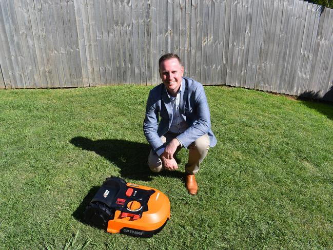 David Mills, GM of McGrath Ballina and Byron, with a model of the Landroid robot mower.