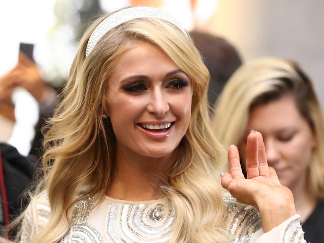 MELBOURNE, AUSTRALIA - NOVEMBER 23: Paris Hilton greets fans during the launch of Platinum Rush at Highpoint Shopping Centre on November 23, 2018 in Melbourne, Australia. (Photo by Robert Cianflone/Getty Images,)