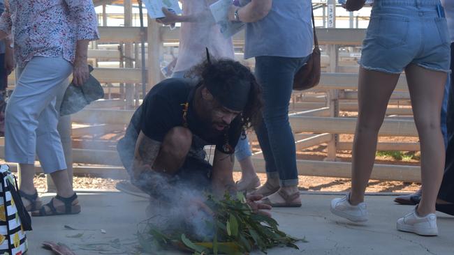 Mandandanji man Aaron Blades, who also goes by his Indigenous name Aaron Dhuril, opening the Maranoa Australia Day Awards 2023 with a traditional smoking ceremony. Picture: Chloe Cufflin.