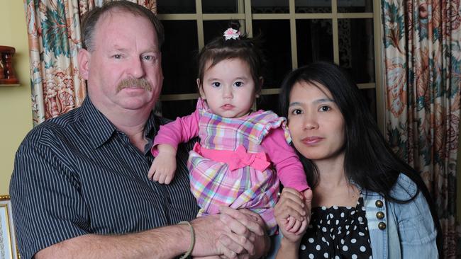 Rory McDonald with his granddaughter Angelina and Andrew’s partner Som in 2012. Picture: Brenton Edwards