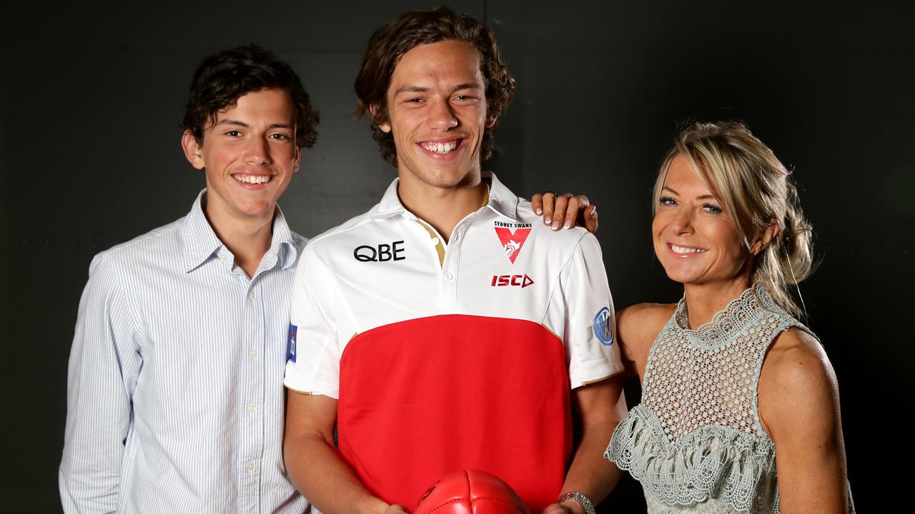 Oliver Florent with mother Rachael and brother Jai after he was drafted in 2016. Picture: Jonathan Ng