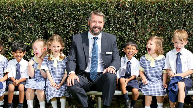 John Colet School's headmaster Julian Wilcock pictured with Lower 1 pupils on their first day in 2017. Picture: Troy Snook