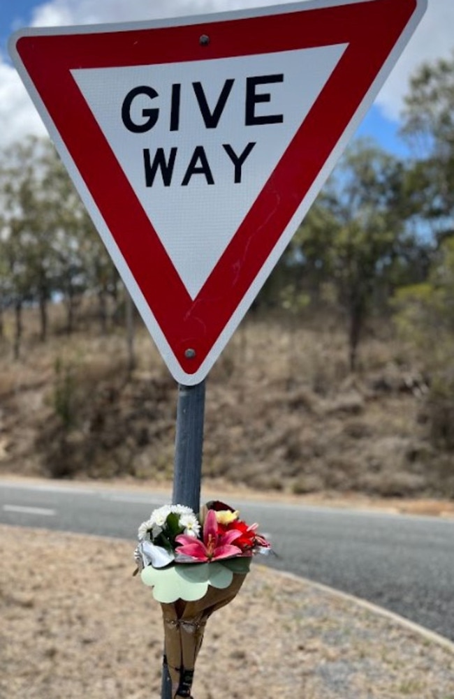 A floral tribute to Anuisha Bone can be seen tied to a give way sign at Access Three on Yeppoon Rd.