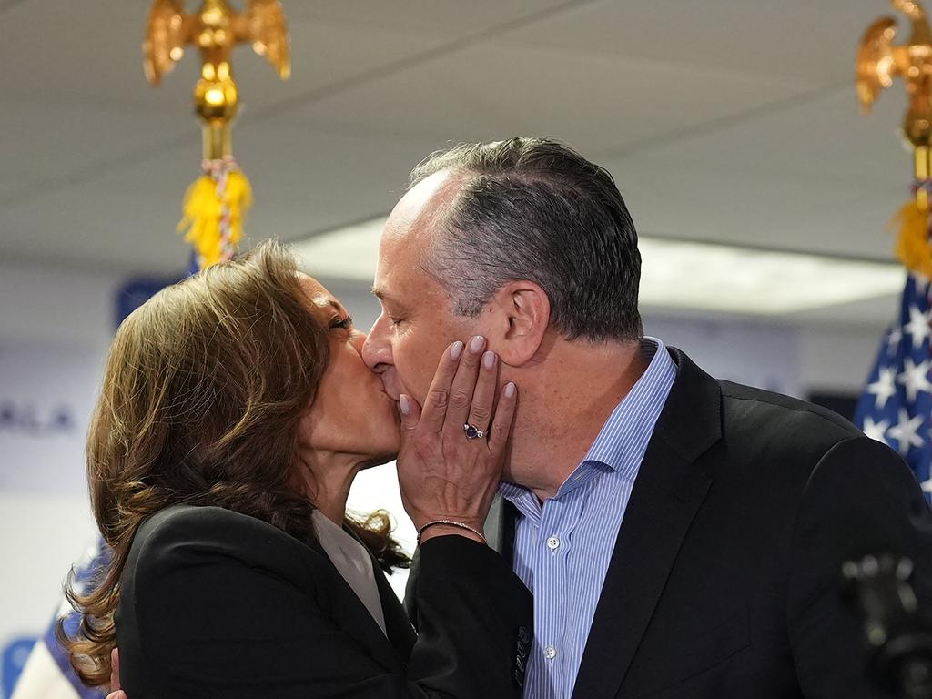 US Vice President and Democratic presidential candidate Kamala Harris and Second Gentleman Doug Emhoff kiss before Harris spoke at her campaign headquarters in Wilmington, Delaware. Picture: AFP