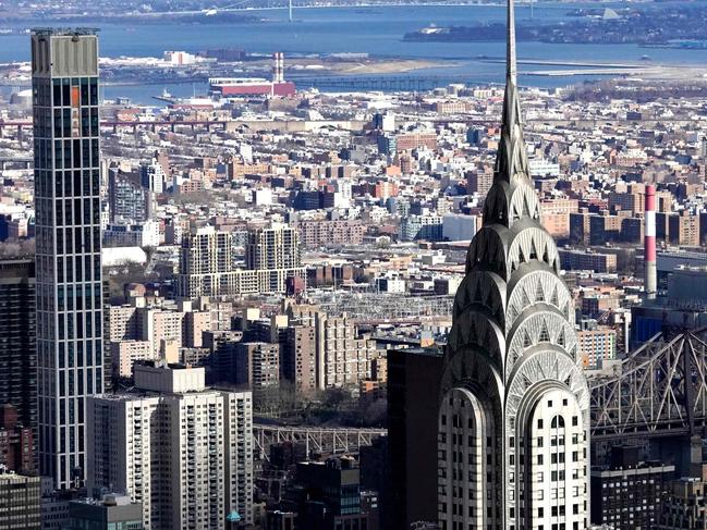 LaGuardia Airport is seen in the background of the Chrysler Building from the 86th floor observatory of the Empire State Building in New York. Picture: AFP