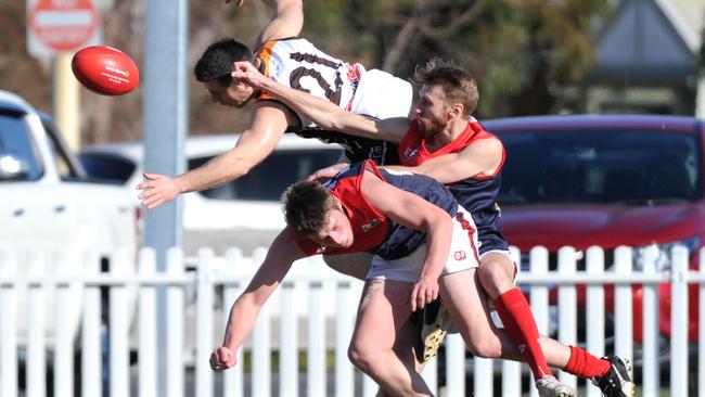 EDFL footy: Tullamarine and Craigieburn lock horns. Picture: Jamie Morey