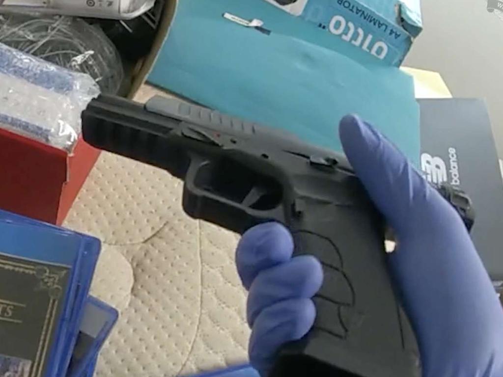 A firearm seized during the raid.