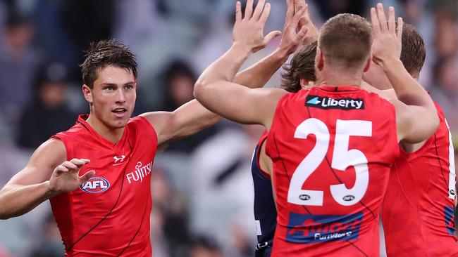 Essendon forward-midfielders Archie Perkins (left) and Jake Stringer will enter the 2024 season without a contract for next year. Picture: Sarah Reed / Getty Images