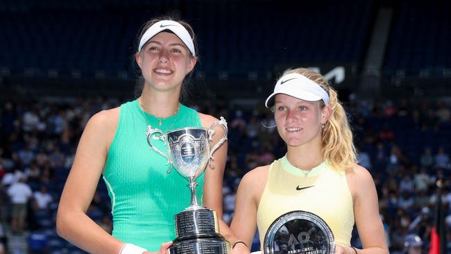 Slovakia's Renata Jamrichova (L) poses with the winner's trophy next to Australia's Emerson Jones during their junior girls' singles final match. Picture: Martin Keep/AFP