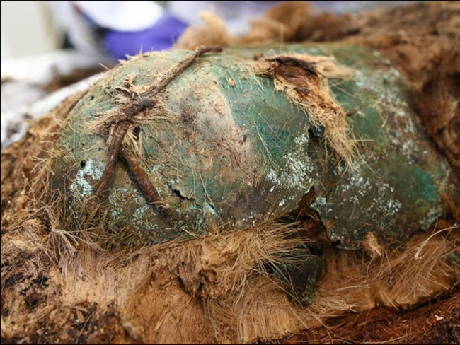 Death mask ... The shaped copper plate found resting over the boy’s face. Source: Siberian Times