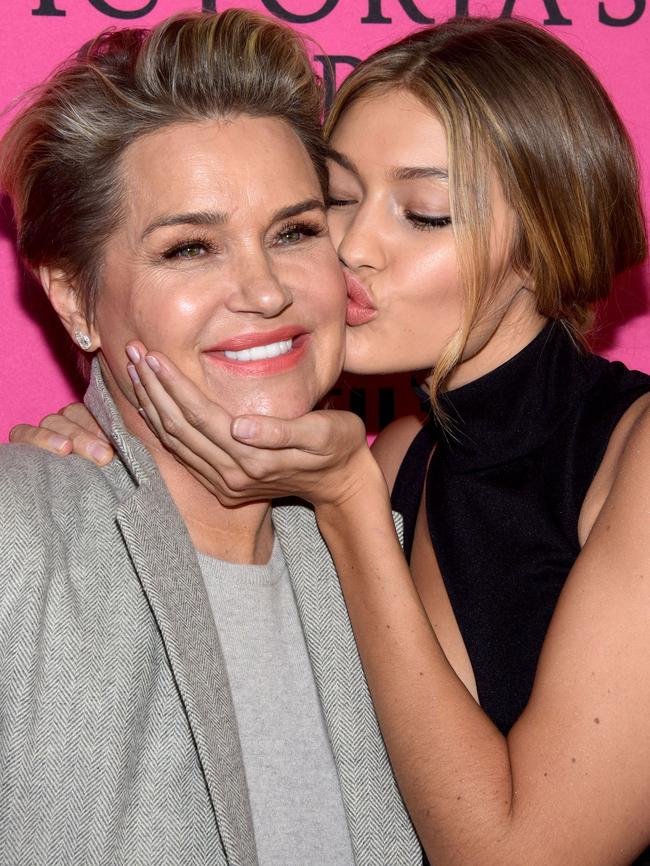 Support ... Yolanda Foster (L) puts on a brave face amid her battle with Lyme disease as her daughter Gigi gives her a kiss.  Picture:  Getty