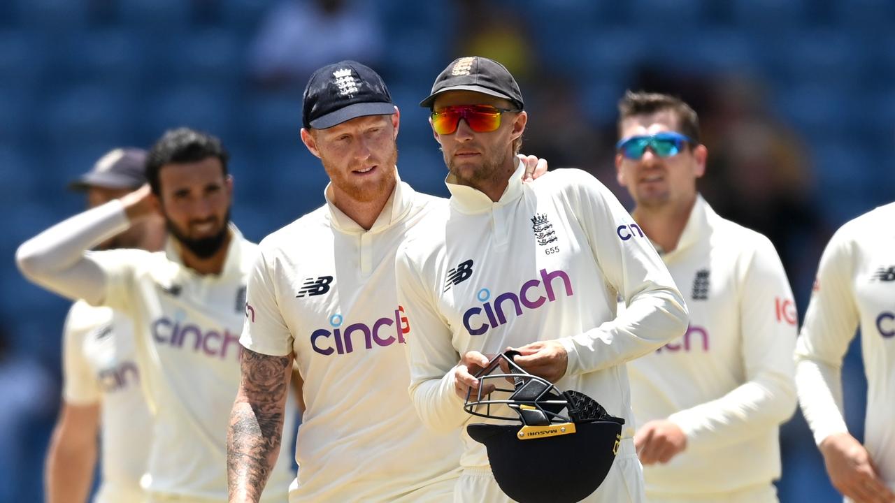 GRENADA, GRENADA - MARCH 27: England captain Joe Root is consoled by Ben Stokes after losing the 3rd Test match between the West Indies and England at National Cricket Stadium on March 27, 2022 in Grenada, Grenada. (Photo by Gareth Copley/Getty Images)