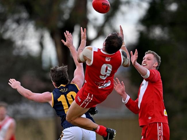 EDFL: Glenroy’s Jacob Grigg attempts a screamer. Picture: Andy Brownbill