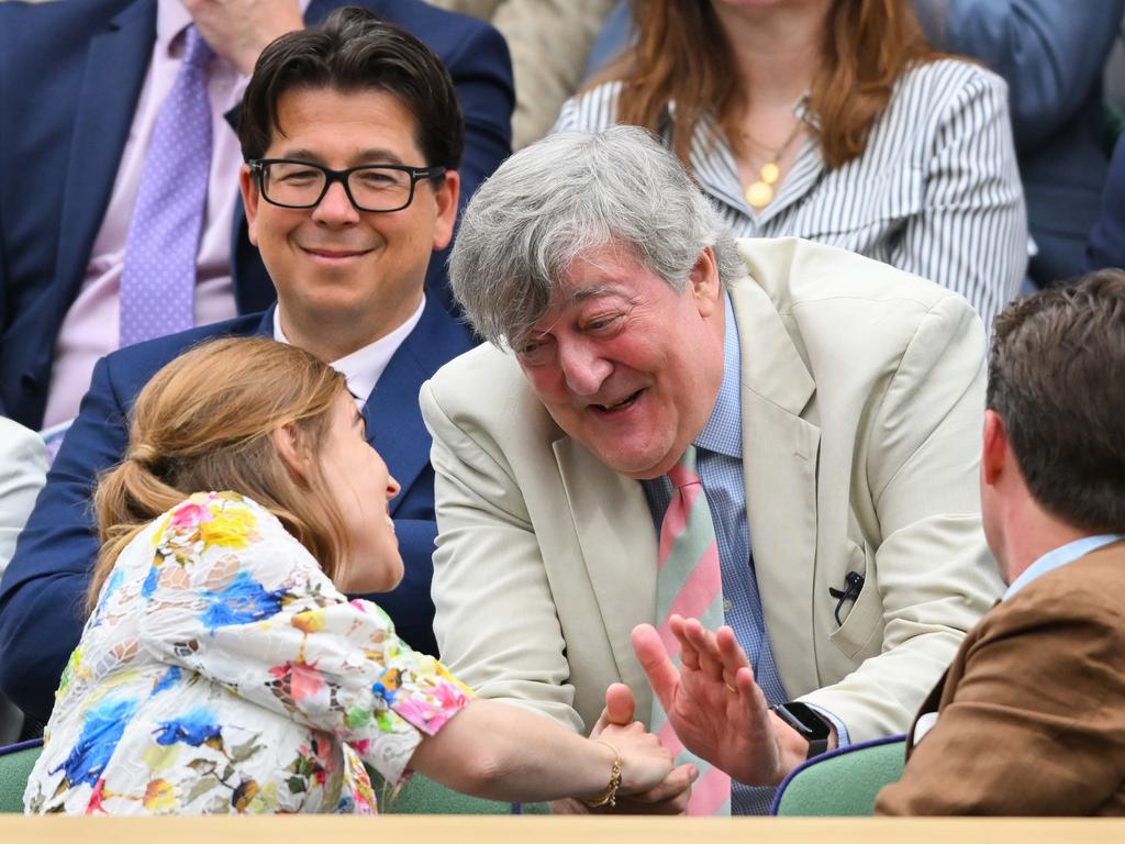 The royal greets Stephen Fry as comedian Michael McIntyre looks on. Picture: Karwai Tang/WireImage