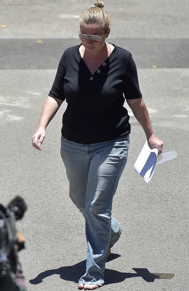 Laura Peverill leaving Townsville watch house, after being charged with manslaughter over the death of a three year old girl in a car. PICTURE: MATT TAYLOR.