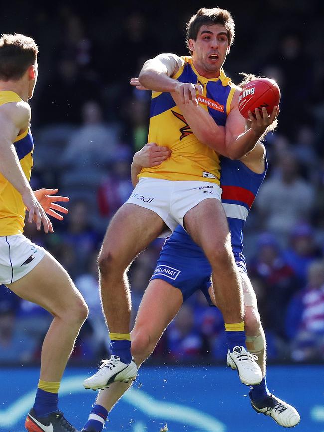  West Coast's Andrew Gaff tackled at Etihad Stadium. Picture: Michael Klein