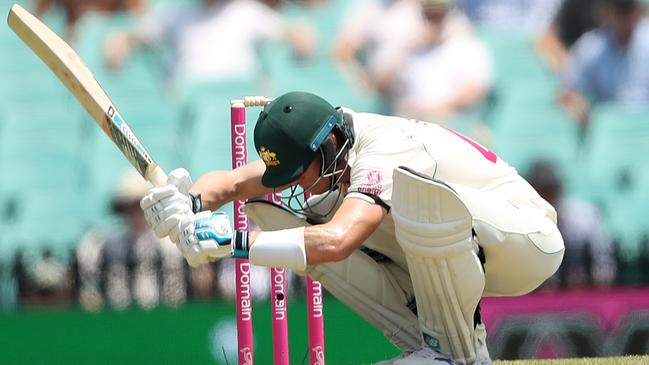 Steve Smith ducks under a Neil Wagner bouncer on day one of the third Test at the SCG. Picture. Phil Hillyard