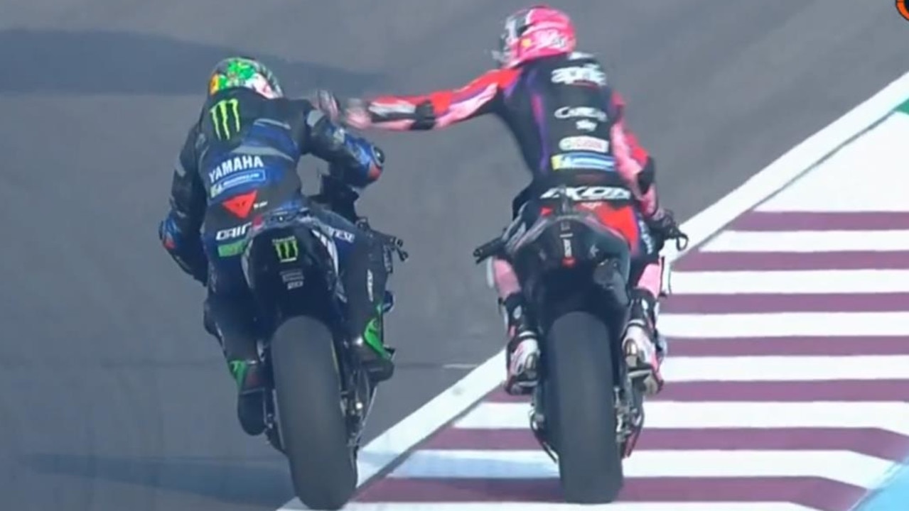 Espargaro slaps his rival in a wild blow-up.
