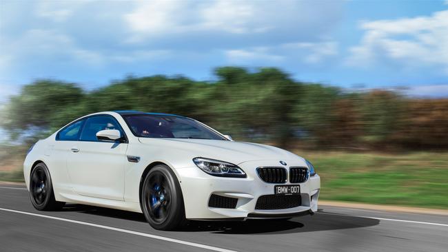 The cars allegedly traded included a BMW M6.