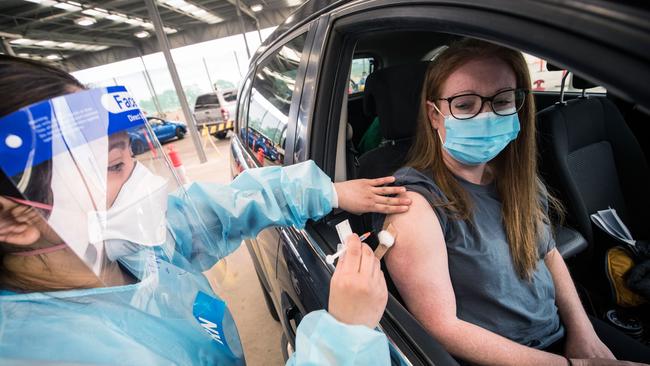 A nurse administers the AstraZeneca COVID-19 vaccine at a drive through vaccination centre in Melton in Melbourne today. Picture: Getty Images