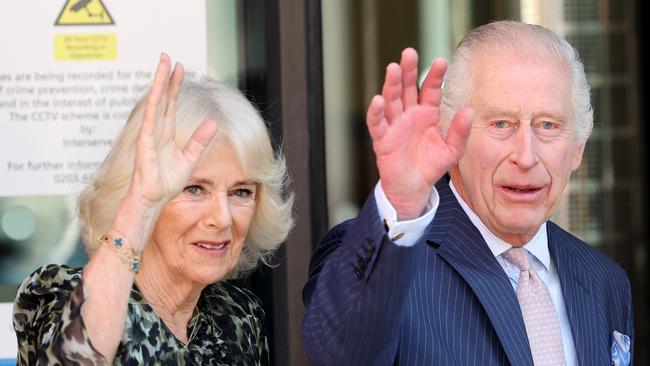 Queen Camilla and King Charles III arrive at the University College Hospital Macmillan Cancer Centre on Tuesday.