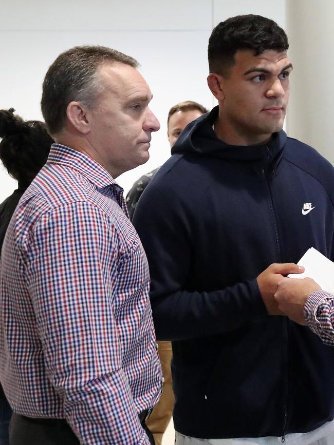 Fifita with Broncos CEO Paul White, after arriving back into Australia after his arrest in Bali. Picture: Liam Kidston