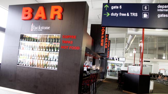 Photos are of a Restaurant at the Coolangatta Airport called the Blackstone Bar and Lounge.  Photos are of the restaurants location in Coolangatta Airport.  L-R in photos is Chef Matteo and food dishes are the Eggs Benedict, the Calamari Salad and the Chorizo with Tomato Chutney.