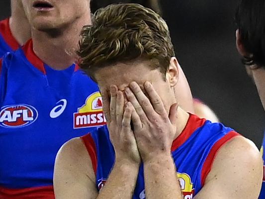 MELBOURNE, AUSTRALIA - AUGUST 20: The Bulldogs look dejected following the round 23 AFL match between Western Bulldogs and Port Adelaide Power at Marvel Stadium on August 20, 2021 in Melbourne, Australia. (Photo by Quinn Rooney/Getty Images)