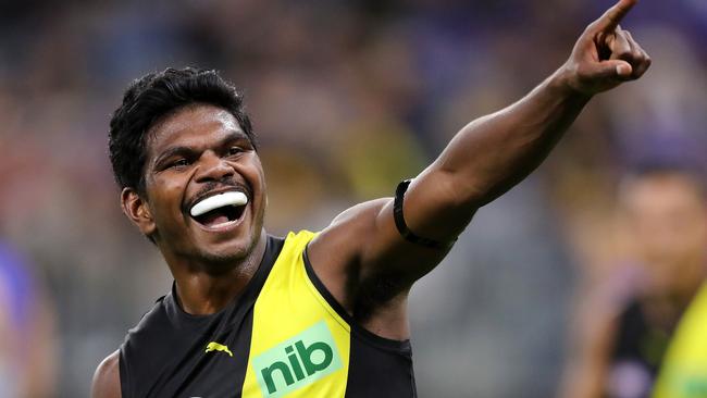 Maurice Rioli celebrates a goal as the Tigers did as they pleased against their listless rivals. Picture: Will Russell/AFL Photos via Getty Images