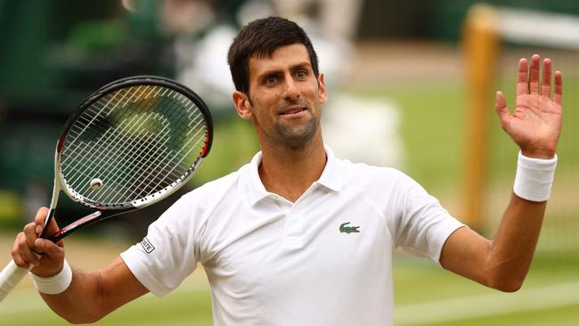 Novak Djokovic celebrates his semi-final win over Rafael Nadal.