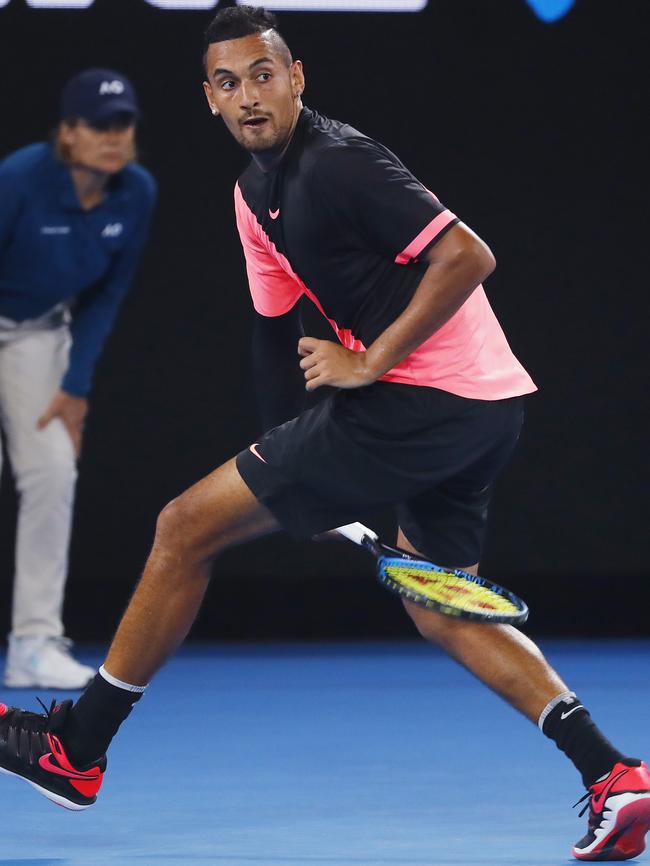 Nick Kyrgios hits a ‘tweener’ against Jo-Wilfried Tsonga. Picture: Michael Klein