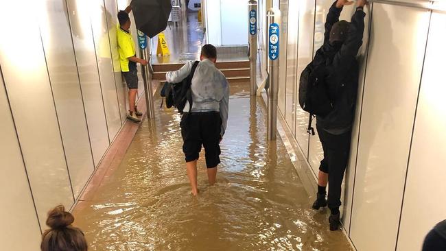 Commuters used various methods to try and stay dry. Picture: Instagram