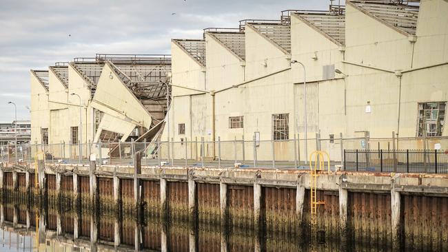 Demolition of the Shed 26 buildings at Port Adelaide in 2019 to make way for housing. Environment Minister David Speirs rescinded interim state heritage listing of the building.