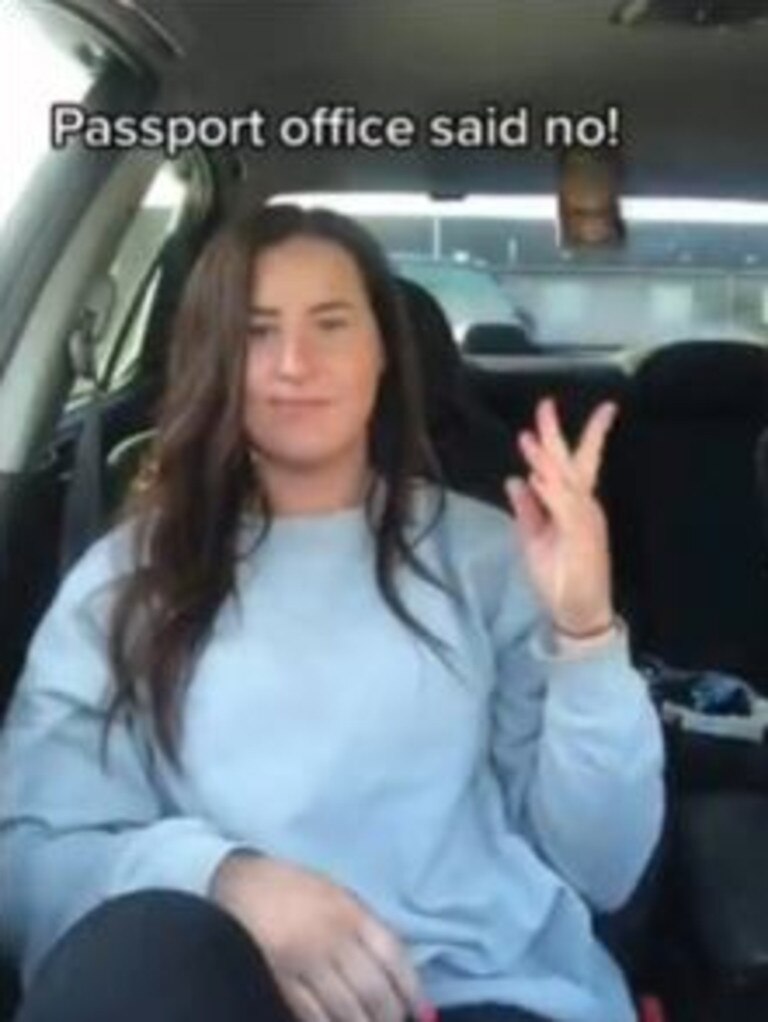 She flings her now useless passport onto the backseat. Picture: Tiktok/jennifermckechnie