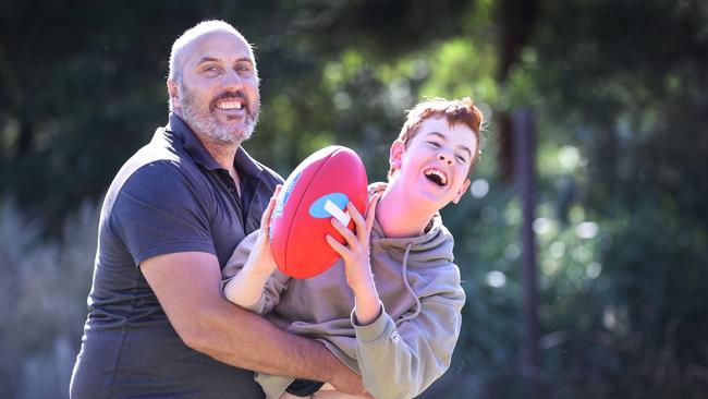 Bone marrow transplant recipient Blake Dridan with former St Kilda great Fraser Gehrig. Picture: David Caird