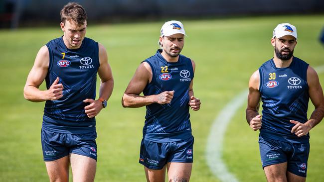 Riley Thilthorpe alongside new recruit Izak Rankine and Wayne Milera at training. Picture: Tom Huntley