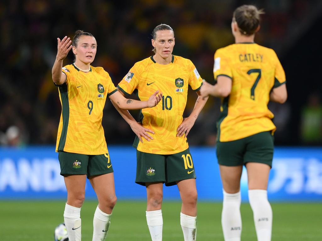 Nonplussed Australian players try to make sense of Nigeria’s second goal. Picture: Justin Setterfield/Getty Images