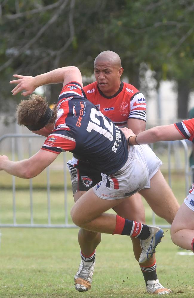 Kirwan State High School hosts St Patrick's College, Mackay, in round 1 of the 2025 Aaron Payne Cup. Anthony Vaigafa bumps off Mark Morrow with a powerful carry. Picture: Evan Morgan