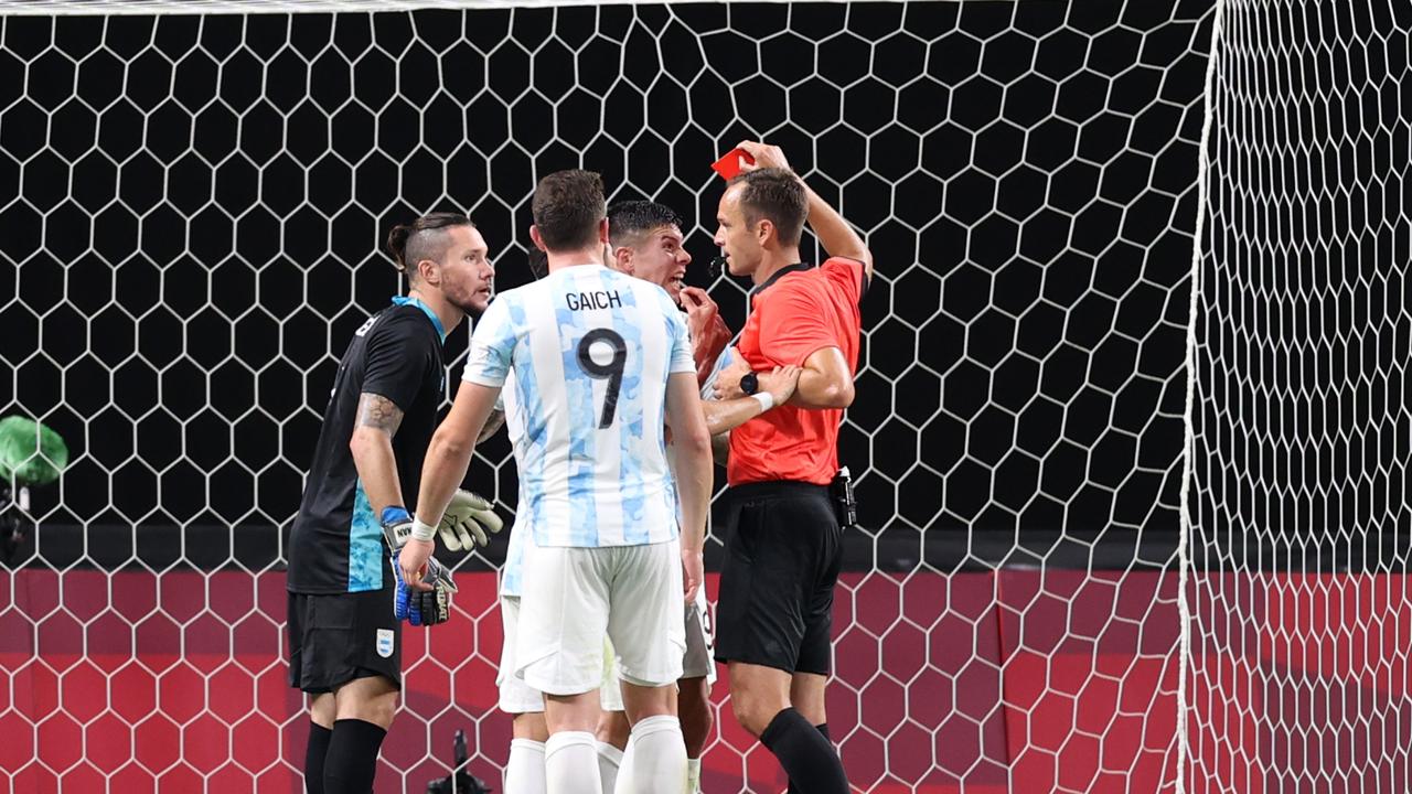 SAPPORO, JAPAN - JULY 22: Francisco Ortega #19 of Team Argentina is shown a red card by Match Referee, Srdan Jovanovic during the Men's First Round Group C match between Argentina and Australia during the Tokyo 2020 Olympic Games at Sapporo Dome on July 22, 2021 in Sapporo, Hokkaido, Japan. (Photo by Masashi Hara/Getty Images)