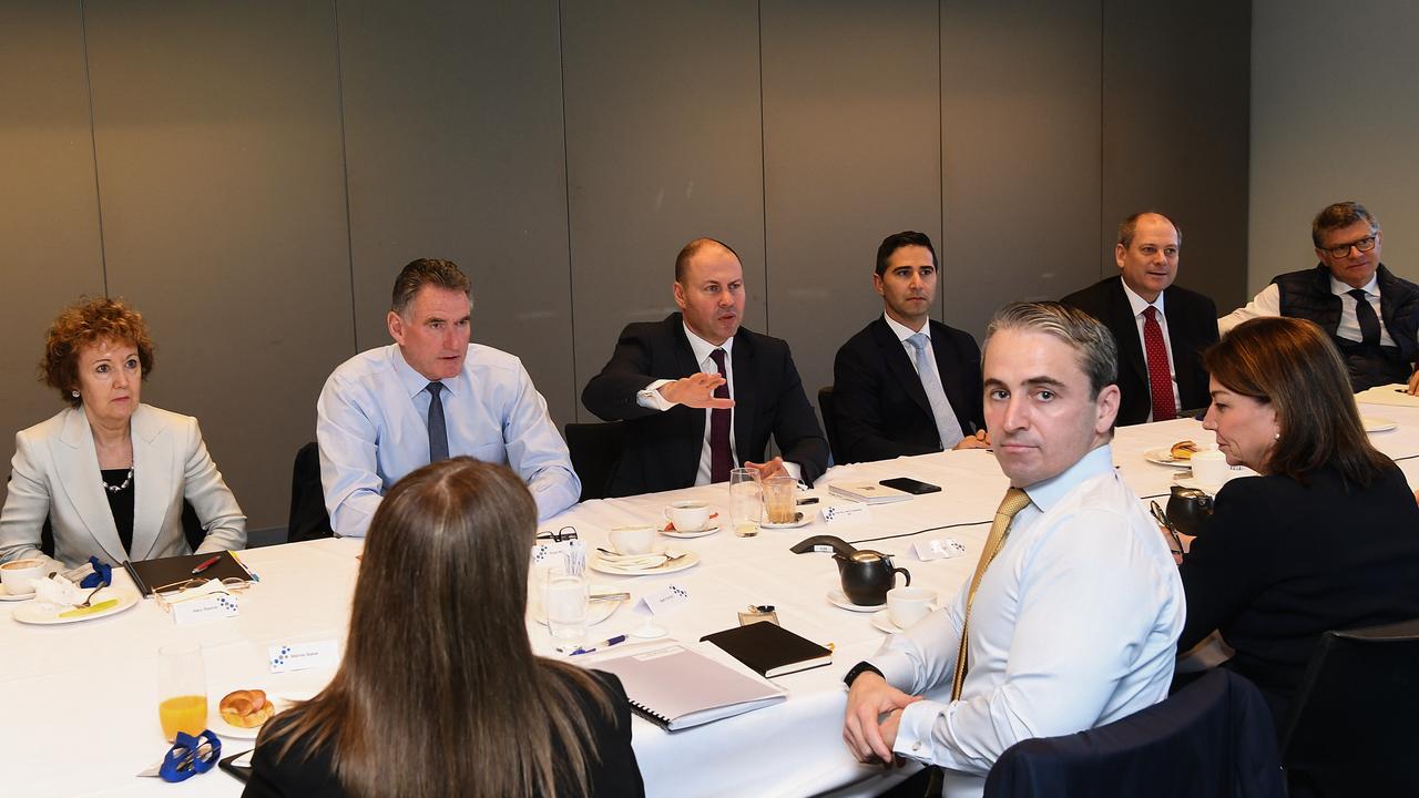 Commonwealth Bank of Australia CEO Matt Comyn (fourth from right) is seen alongside Anna Bligh, the CEO of Australian Banking Association (second from right) during a meeting with Australian Federal Treasurer Josh Frydenberg (centre) and other banking executives in Sydney, Wednesday, March 11, 2020. (AAP Image/Fairfax Media Pool, Peter Braig)