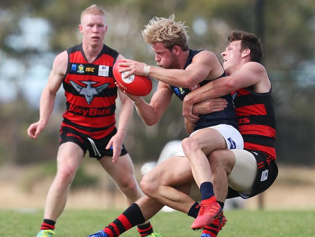 Jack Donnellan of Launceston and Haydn Smith of Lauderdale in Saturday’s Lauderdale V Launceston Tasmanian State League match. Picture: NIKKI DAVIS-JONES