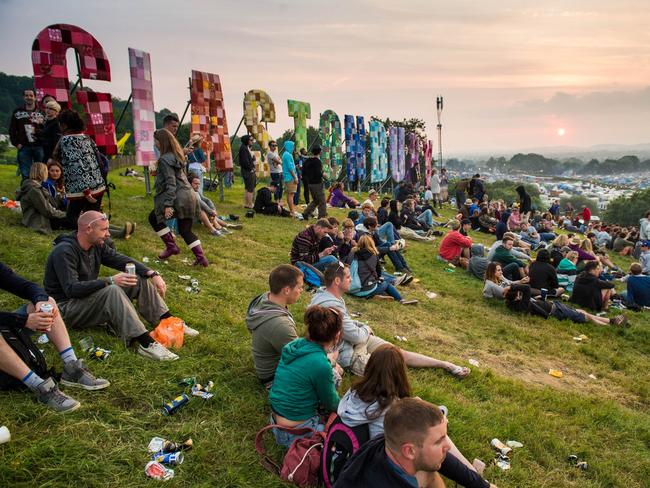 Festival-goers enjoy the atmosphere prior at Glastonbury Festival. Picture: Ian Gavan/Getty Images