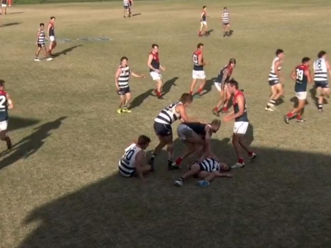 5. Surfers Paradise player Matthew Green pictured in a sequence slinging Broadbeach Cats player Nic Burton to the ground. Picture taken from livestream.