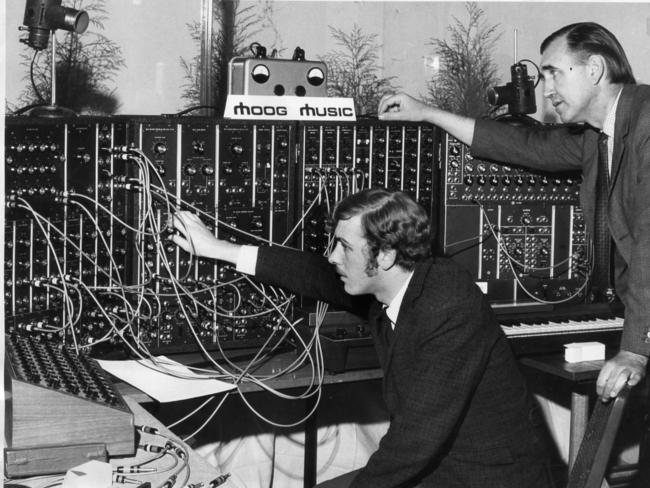 Adelaide musician Phil Cunneen used the Moog synthesiser in 1969, when it cost $10,000, watched by Derek Jolly.